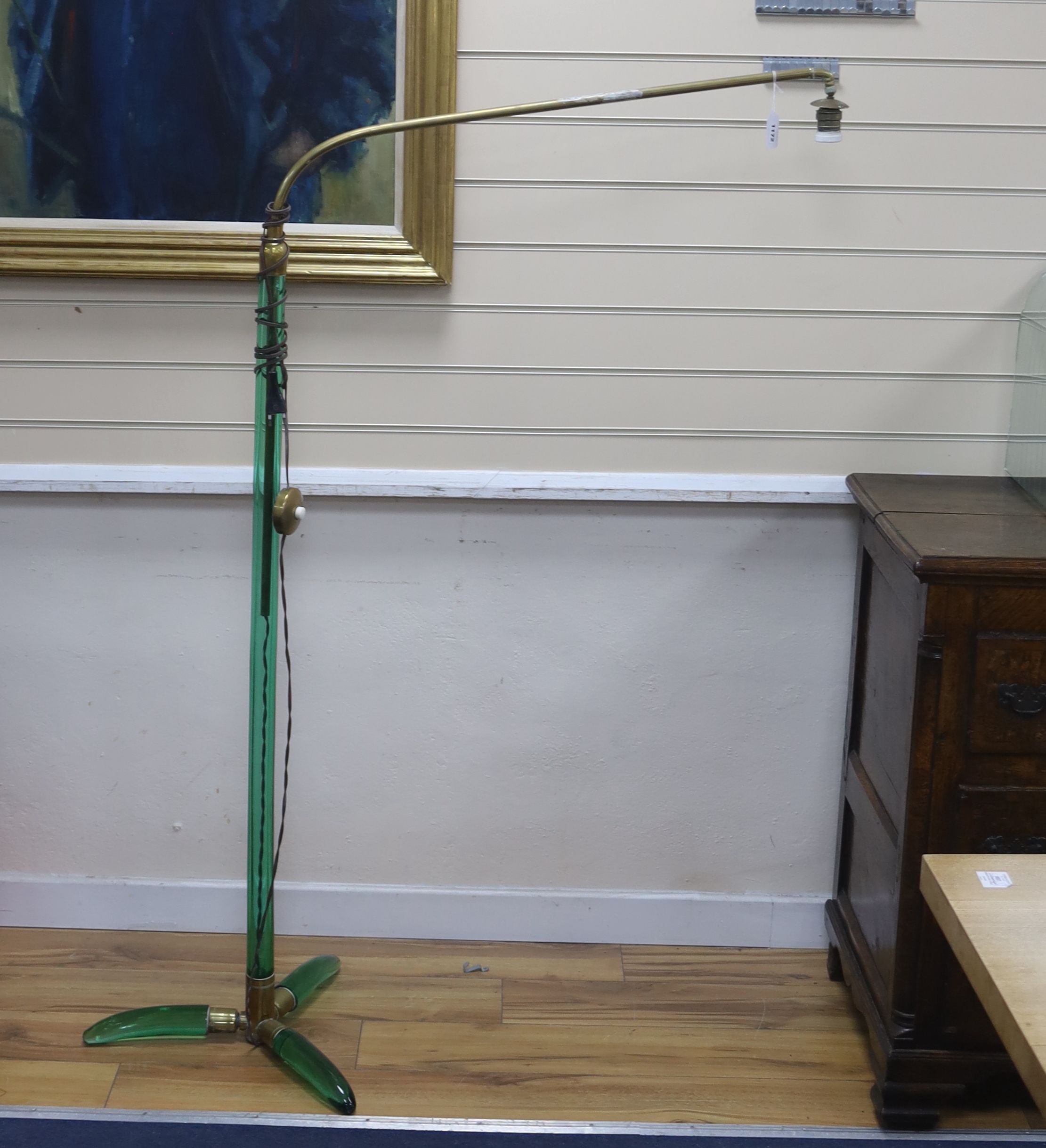 An unusual sectional green glass and brass standard lamp, height 154cm